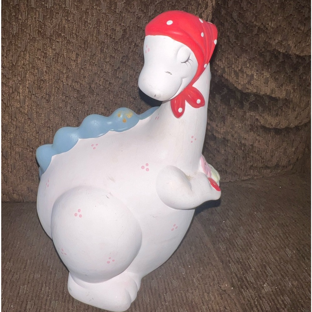 Cute vintage dinosaur piggy bank